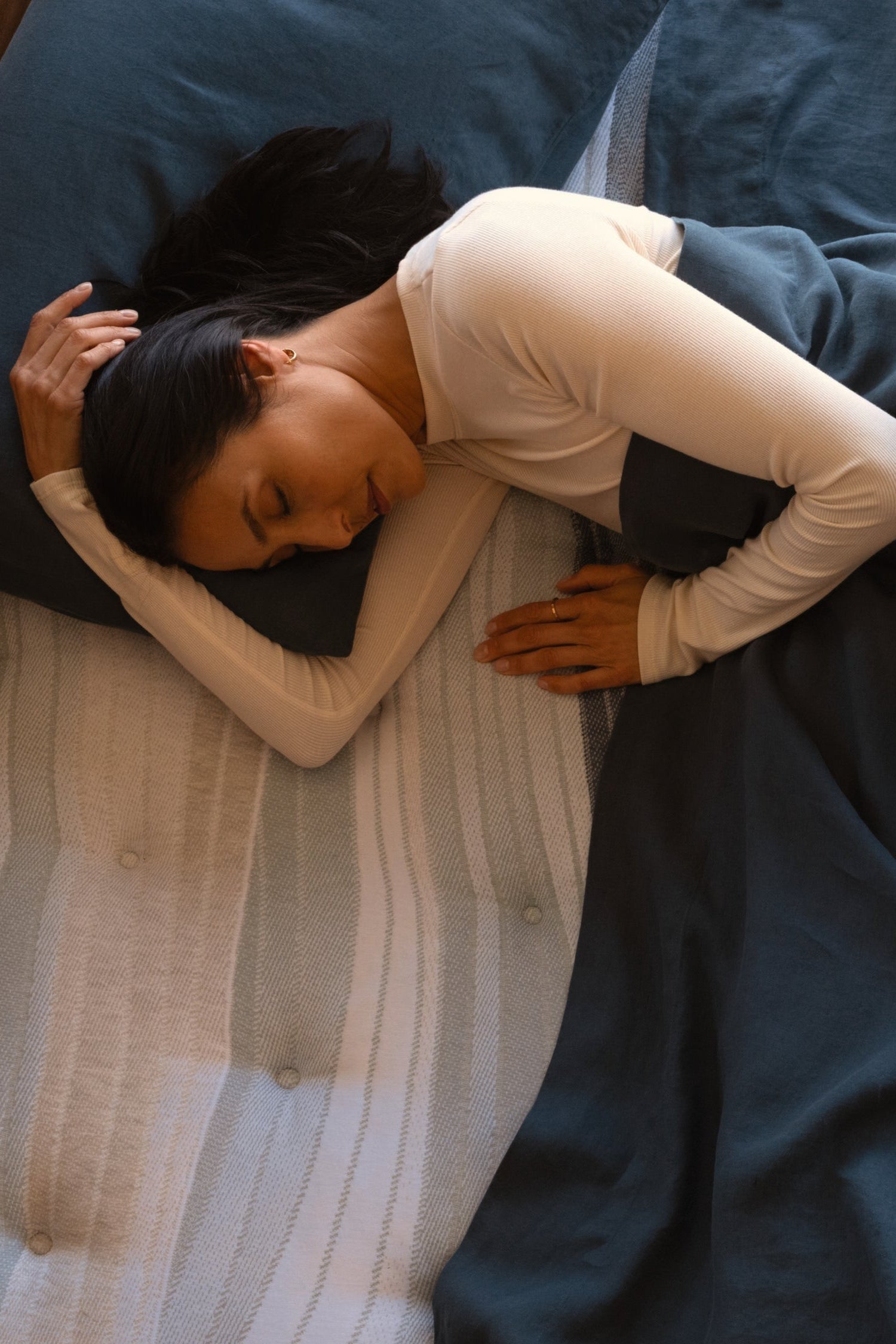 Woman laying in bed